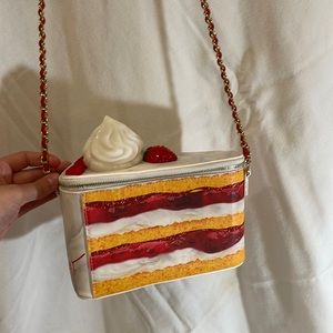 Betsey Johnson strawberry shortcake crossbody purse.